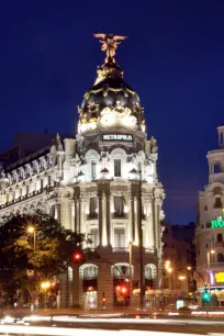 The Metropolis Building in Madrid at night