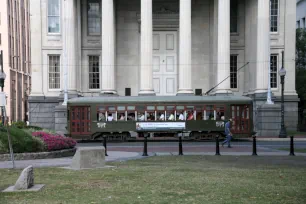 The St. Charles streetcar in front of the Gallier Hall