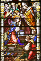 Stained Glass Window showing the coronation of King Louis IX in the St. Louis Cathedral in New Orleans