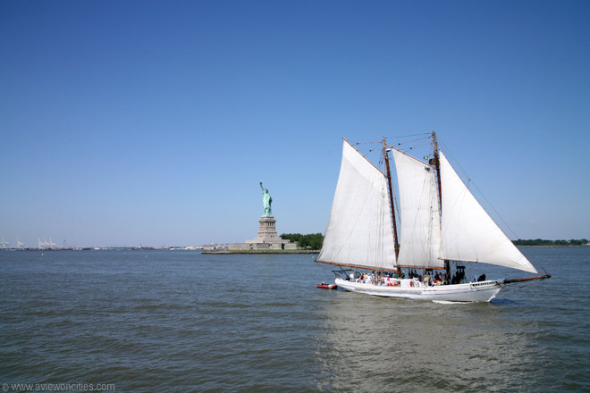 Sailboat with Statue of Liberty in background