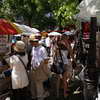 Browsing for paintings at Place du Tertre