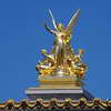 Gilded statue of Poetry on top of the Palais Garnier