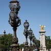 A row of lampposts on the Pont Alexandre III