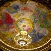 The chandelier and ceiling painting in the auditorium of the Opéra Garnier