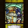 Stained glass depicting the minting process, Palazzo Massimo