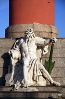 River god Statue at the Rostral Column in St. Petersburg