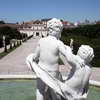 View from behind a small statue in the Belvedere Garden