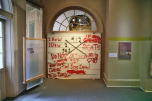 Spray-painting messages, Hurricane Museum, New Orleans
