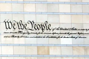 We the People inscription on the front facade of the National Constitution Center in Philadelphia