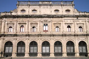 The west facade of the city hall or ayuntamiento in Seville, Spain